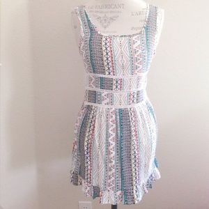 NWOT "Good Vibes" geometric ruffle-hem dress
